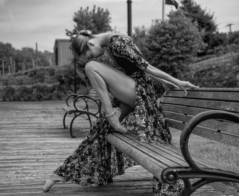 Woman sitting on bench