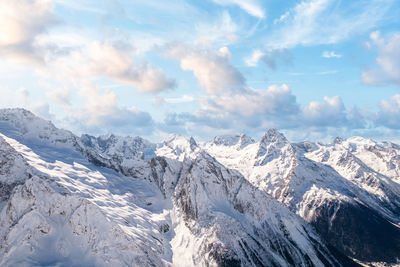 Light clouds over a mountain peak