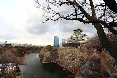 View of bridge over river in city