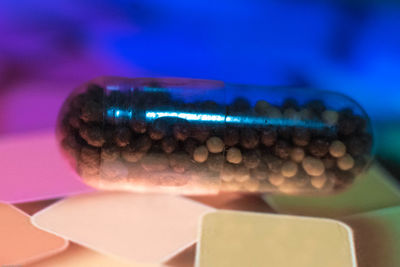 Close-up of illuminated lighting equipment on table