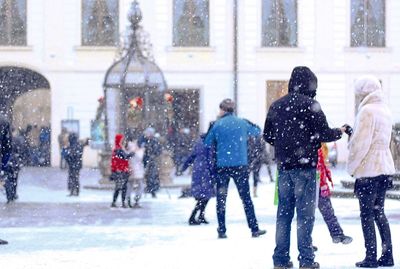People walking on street during winter