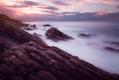 Scenic view of sea against sky during sunset