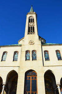 Low angle view of cathedral against clear blue sky