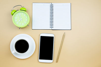 High angle view of coffee cup on table