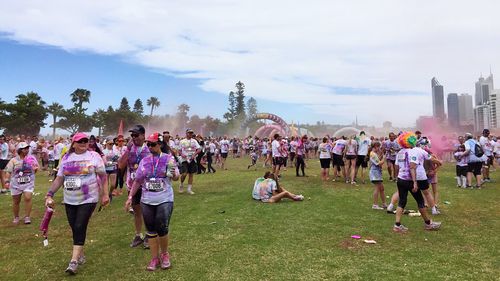 People on field against sky