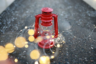 High angle view of glass jar on table