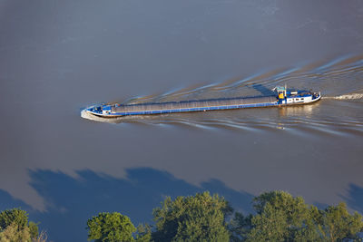 Aerial view of the barge on the danube river and its floodplain in serbiaand croatia