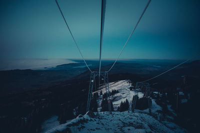 Scenic view of mountains against sky during winter