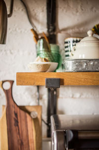 Modern kitchen japandi style, kitchen shelves in natural wood, oak
