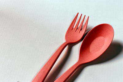 High angle view of pencil on table against white background
