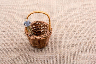 Close-up of wicker basket on table