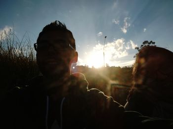 Portrait of man against sky during sunset