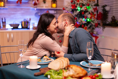 Friends having food at restaurant