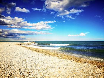 Scenic view of beach against sky