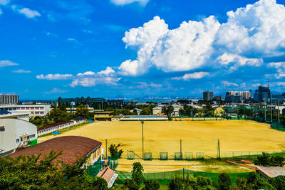 High angle view of soccer field against sky