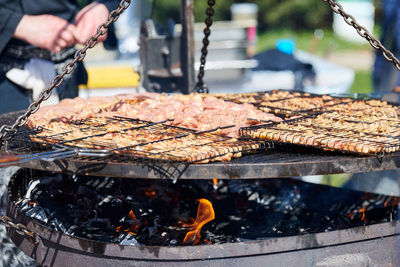 Meat cooking on barbecue grill