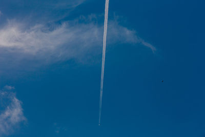 Low angle view of vapor trail in sky