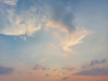 Low angle view of cloudy sky during sunset