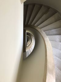 Directly below shot of spiral staircase in building