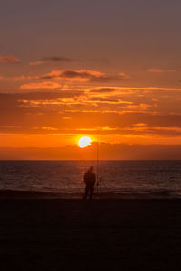 Scenic view of sea at sunset