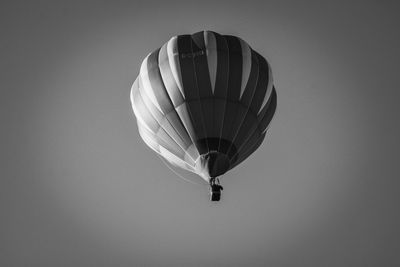 Low angle view of hot air balloon flying in sky