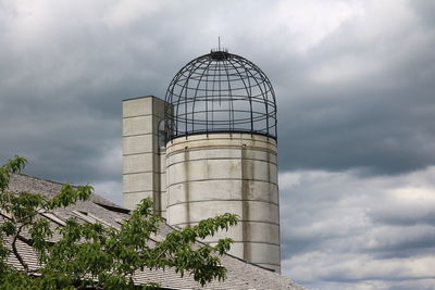 Low angle view of water tower against sky