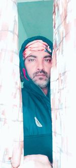 Portrait of young man looking away