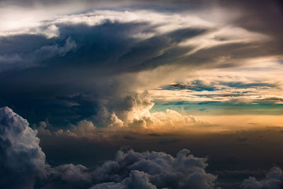 Low angle view of cloudscape against sky during sunset