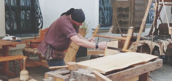 Man working on wood