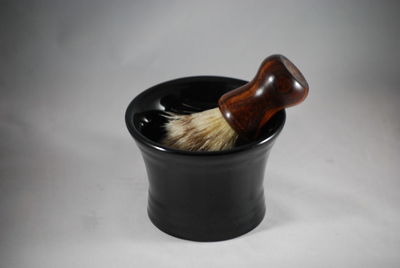 High angle view of drink on table against white background