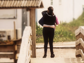 Full length of woman standing outdoors