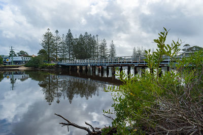 Bridge over lake against sky