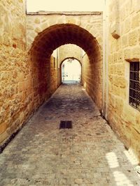 Narrow alley along buildings