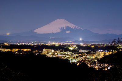 Fuji in the moonlight and the night view.