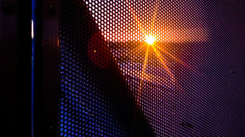 Full frame shot of illuminated lights on window