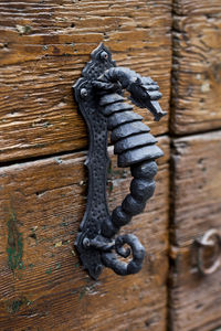 Close-up of wooden door handle