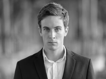 Portrait of young man standing outdoors