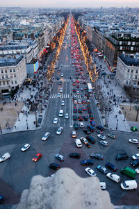 High angle view of busy street amidst buildings in city