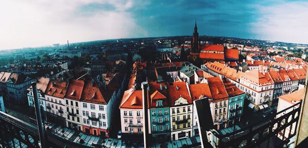 High angle view of buildings in city against sky