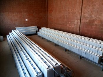 High angle view of empty benches on table