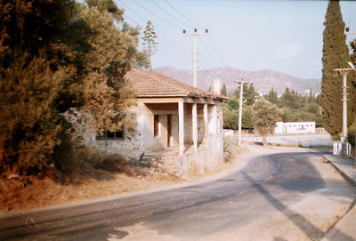 Street by house at countryside