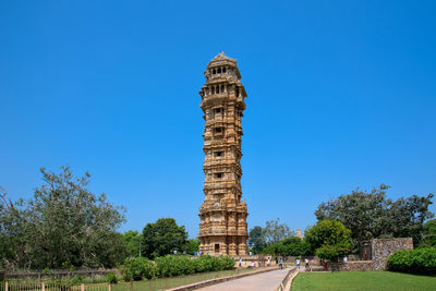 Low angle view of historical building against blue sky