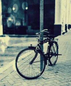 Bicycle parked on footpath