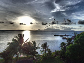 Scenic view of sea against cloudy sky