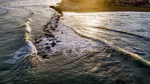 High angle view of sea during sunset