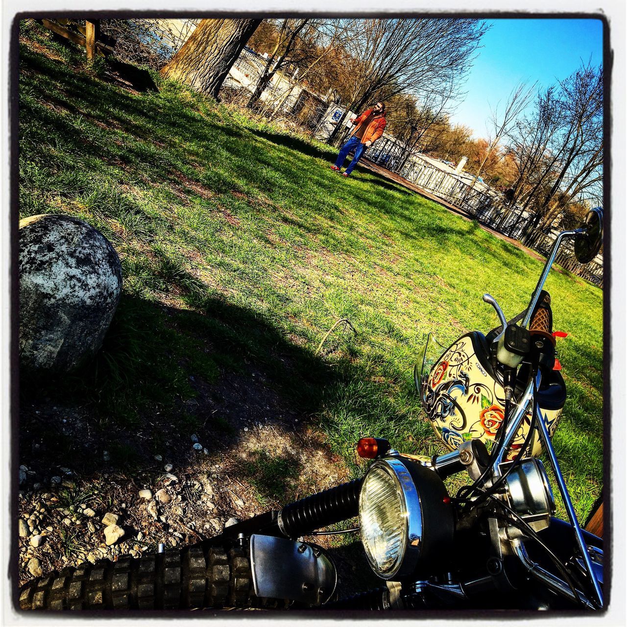 transfer print, water, auto post production filter, tree, bicycle, sunlight, river, sky, day, men, nature, outdoors, leisure activity, mode of transport, lifestyles, high angle view, transportation, incidental people