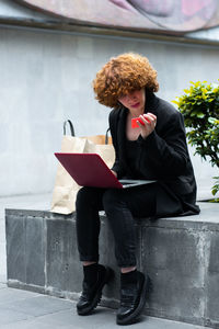 Young woman using digital tablet