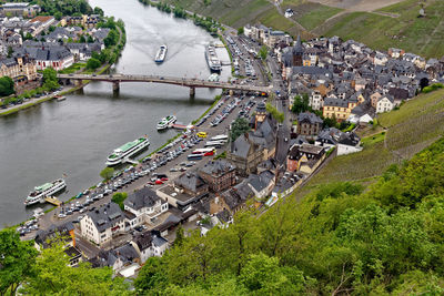 High angle view of houses and river in city