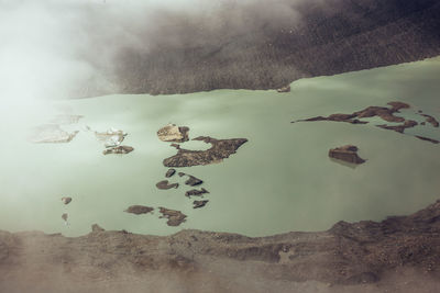 Aerial view of lake and rocks