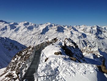 Scenic view of snow covered mountains